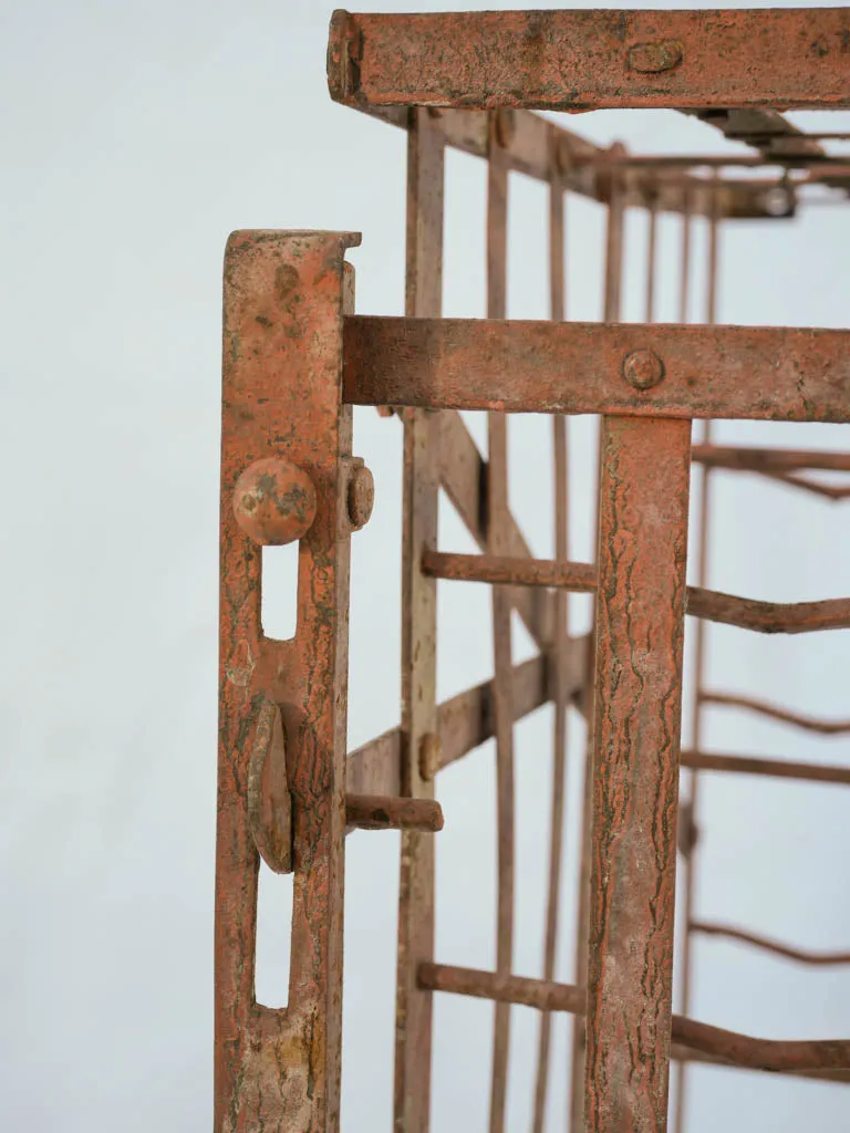 19th-century French wall-mount iron wine storage cage - 72 bottles, 45" x 22"