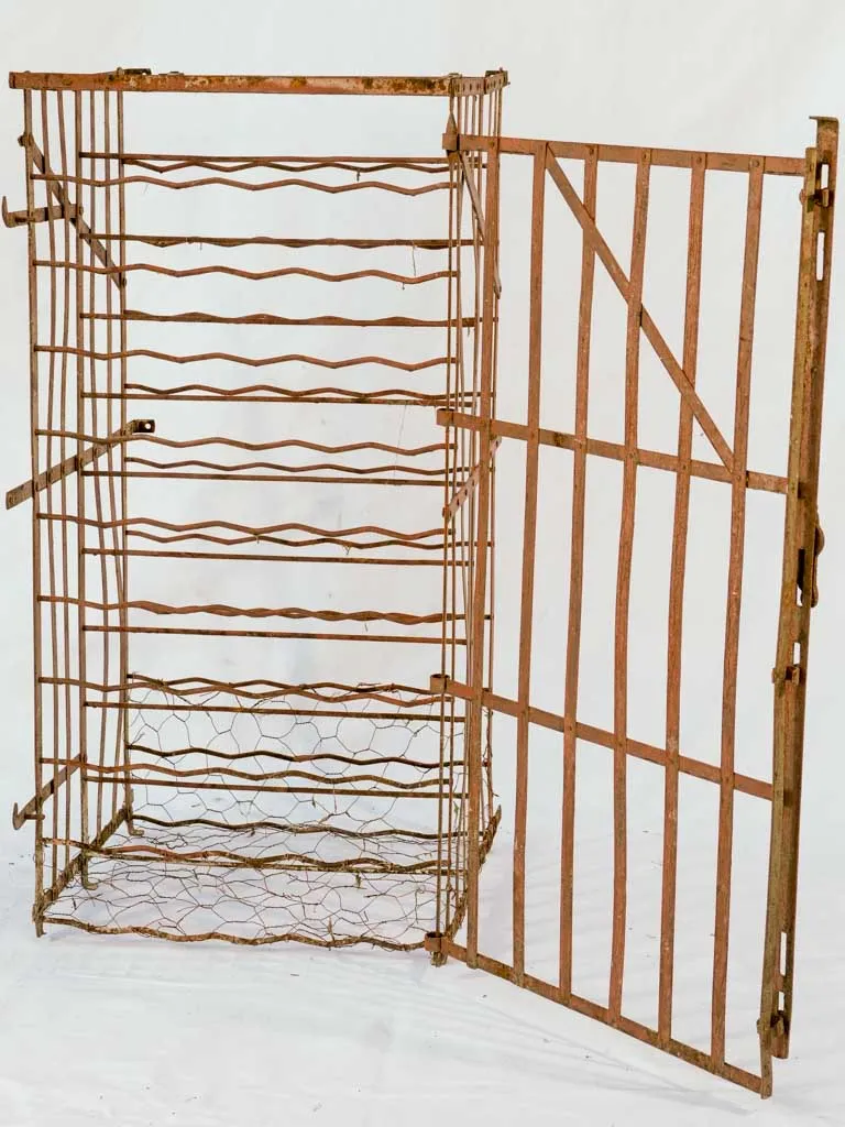 19th-century French wall-mount iron wine storage cage - 72 bottles, 45" x 22"